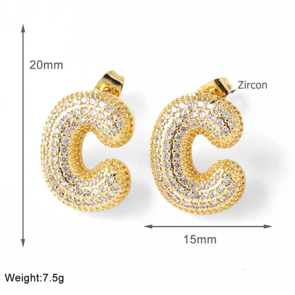 FLOLA Clear Crystal Bubble Letter Earrings for Women Copper Gold Plated Initial Ear Studs Name Jewelry Gifts ersa009