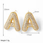 FLOLA Clear Crystal Bubble Letter Earrings for Women Copper Gold Plated Initial Ear Studs Name Jewelry Gifts ersa009