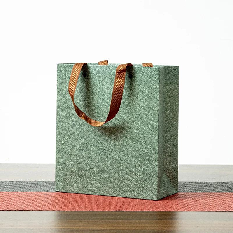 Sunshine Packaging Custom Design Luxury Logo Printed Shopping Gift Cosmetic Clothing Kraft Paper Bag