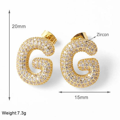 FLOLA Clear Crystal Bubble Letter Earrings for Women Copper Gold Plated Initial Ear Studs Name Jewelry Gifts ersa009