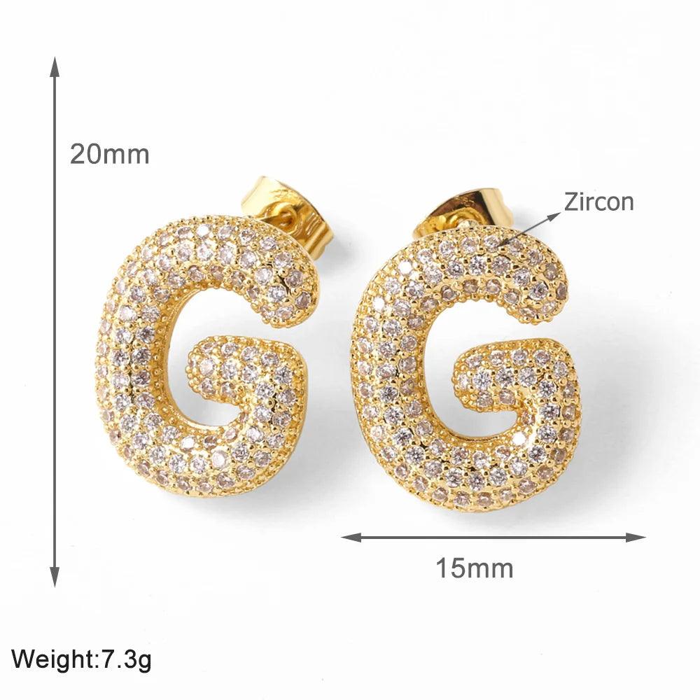 FLOLA Clear Crystal Bubble Letter Earrings for Women Copper Gold Plated Initial Ear Studs Name Jewelry Gifts ersa009